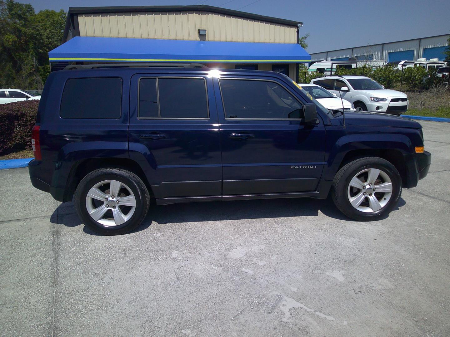 2016 BLUE JEEP PATRIOT SPORT (1C4NJPBB3GD) , located at 10405 Abercorn Street, Savannah, GA, 31419, (912) 921-8965, 31.988262, -81.131760 - Photo#2